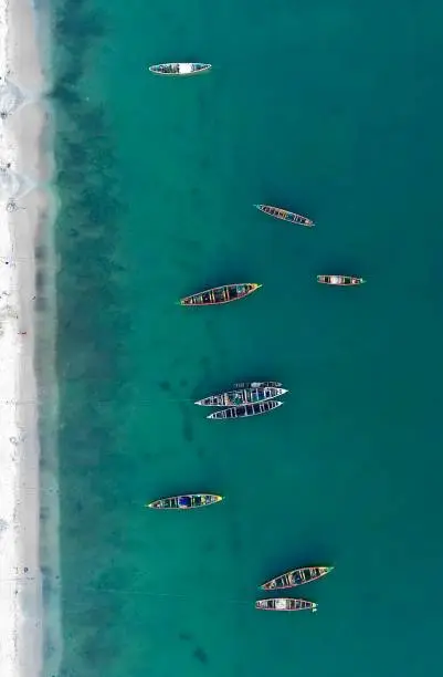 Top down view of fishermen’s canoes moored of the beach