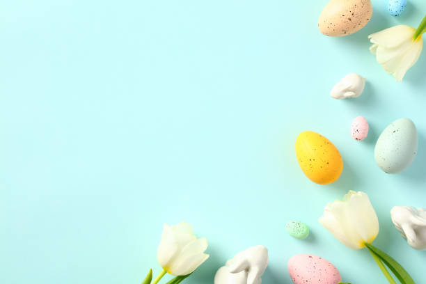 istock Happy Easter concept. Greeting card template with Easter eggs and spring flowers. 1467947333