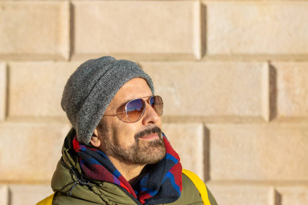 istock Man in winter clothes and sunglasses. 1467947770