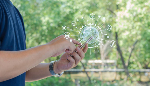 istock Farmer holding smartphone with modern interface icons, Farmers analyze yields with smart technology for business growth in the farm, ESG, environment icon and ethical business on network connection. 1467947819