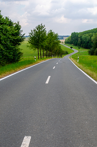 quiet winding country road in germany