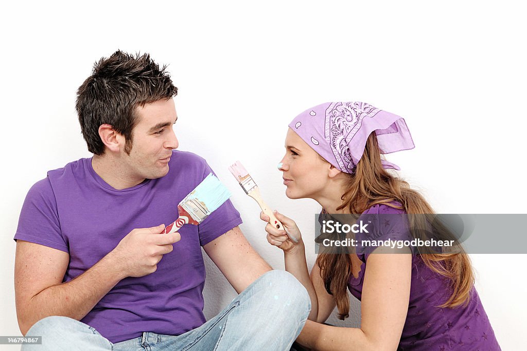 pink or blue couple deciding about colour to paint room 20-29 Years Stock Photo