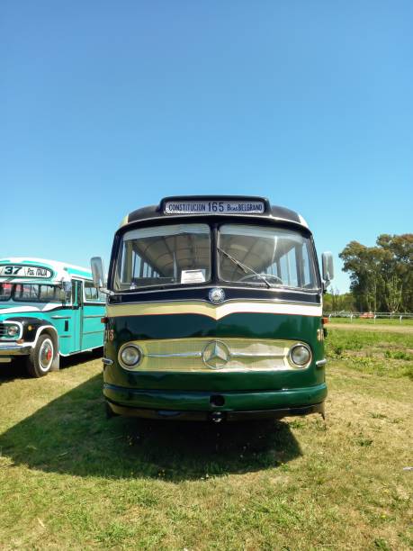 Old green 1961 Mercedes Benz O 321 H in a park. Public passenger transport in Buenos Aires San Isidro, Argentina – October 08, 2022: Old green 1961 Mercedes Benz O 321 H in the countryside. Public passenger transport in Buenos Aires. Autoclasica 2022 classic car show. Copyspace mercedes argentina stock pictures, royalty-free photos & images