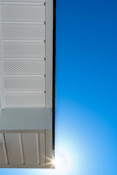 istock Looking up at newly installed fascia and perforated soffit – sun flare 1467950149
