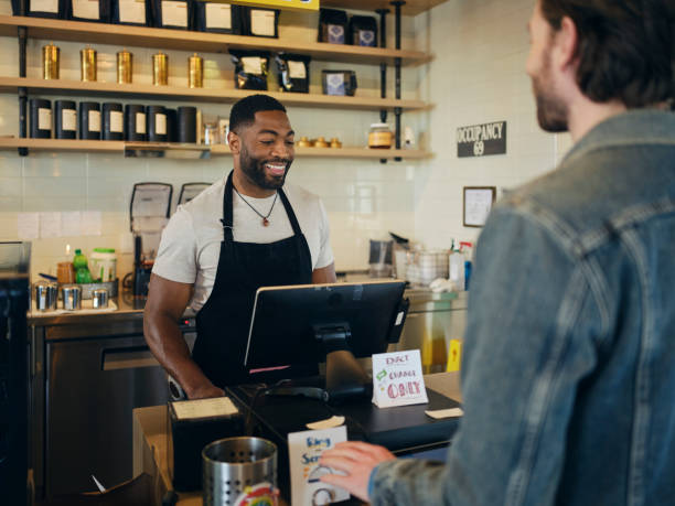 istock Customers and Employees in a Coffee Shop 1467950652