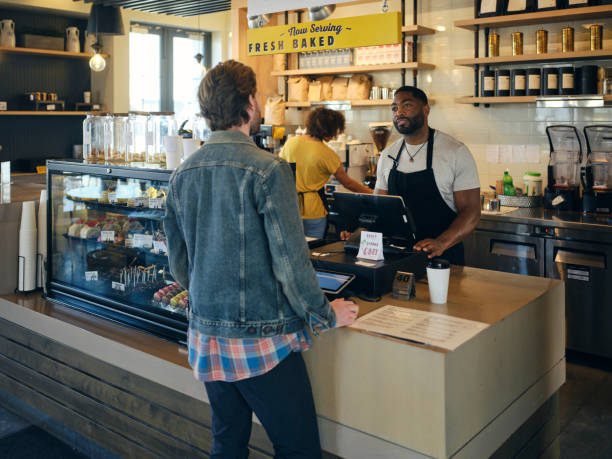 istock Customers and Employees in a Coffee Shop 1467951266