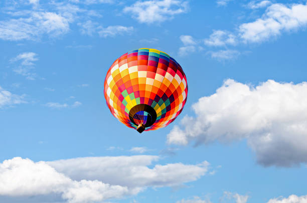 istock Hot air balloon flight over blue sky 1467951441