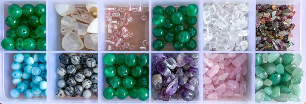 istock amethyst crystals, green aventurine, rose quartz on storage box 1467951557