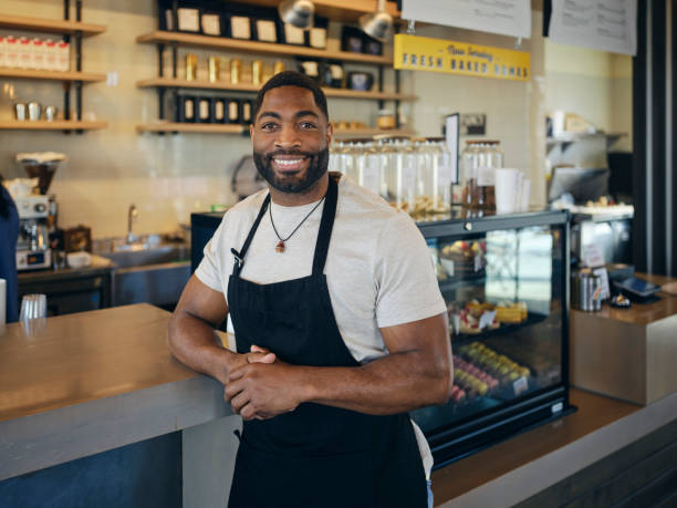 istock Customers and Employees in a Coffee Shop 1467951713