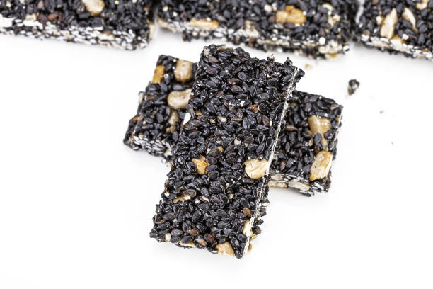 istock Sesame seeds Bar, Grain Bar, Nut Bars, Peanut Bar - sweet snack on white background 1467951864