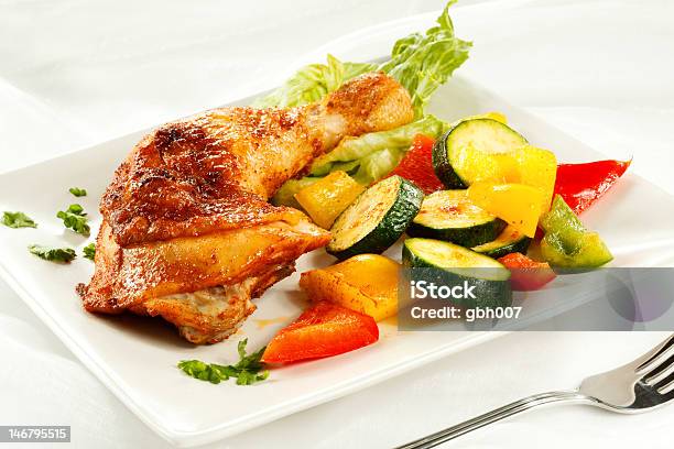 Roasted Chicken Leg And Vegetables Stock Photo - Download Image Now - Barbecue - Meal, Chicken Drumstick, Chicken Meat