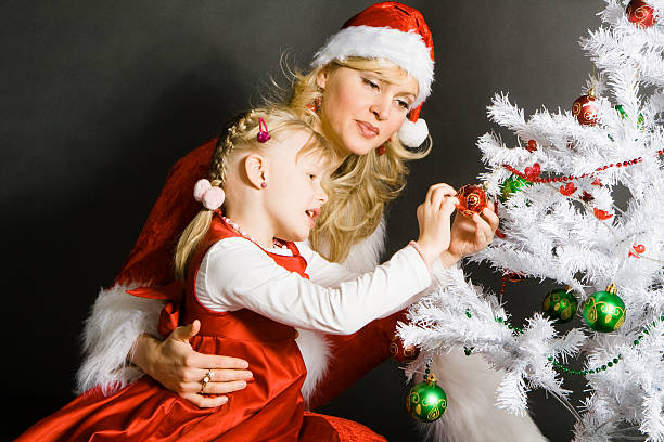 istock santagirl playing with little girl 146795527