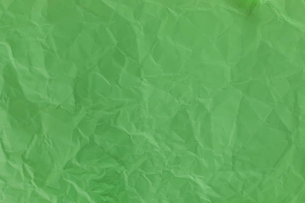 Green Crumpled Paper Background stock photo