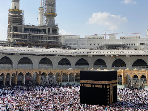 Muslim Pilgrims at The Kaaba in The Haram Mosque of Mecca , Saudi Arabia, In the morning performing umrah