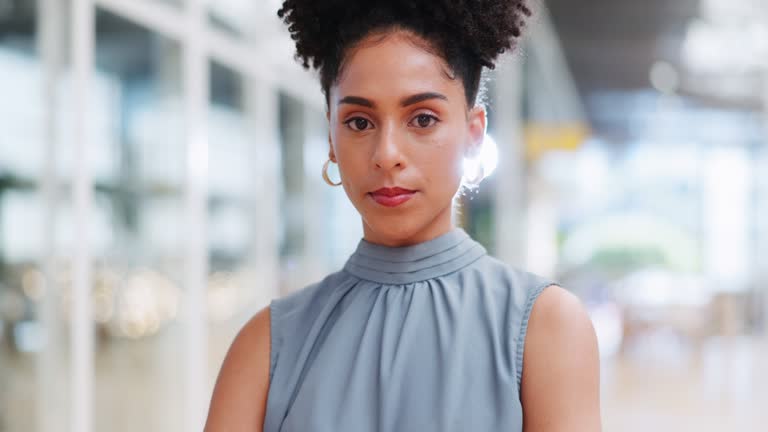 Face, mindset or mission and a business black woman at work standing in her office with a vision for the future. Motivation, goal and target with a female employee working for corporate success