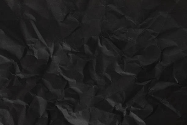 黒いしわくちゃの紙の背景
