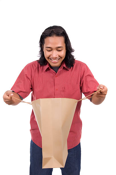 istock Long Hair Man With Paper Bag 146796433