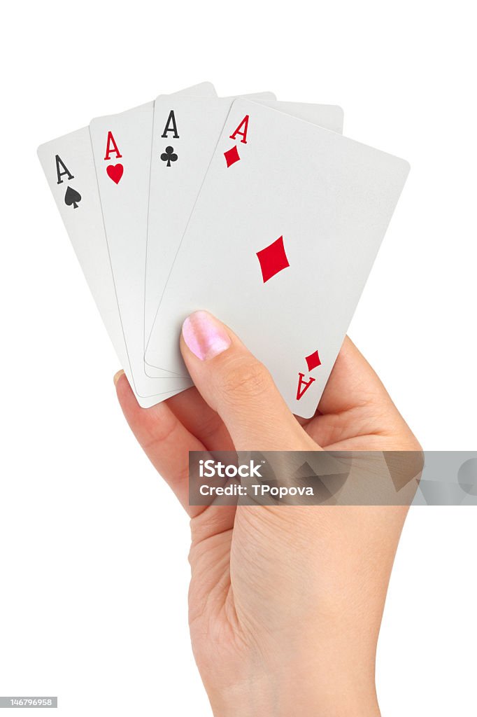 Рука с четырьмя aces - Стоковые фото Азартные игры роялти-фри