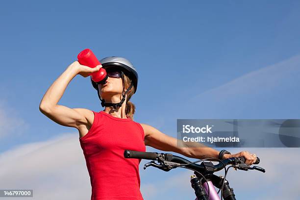 Woman Drinking Water In Her Bike Stock Photo - Download Image Now - Cycling, Drinking, Sport