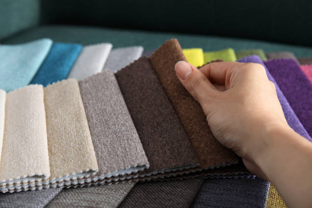 istock Woman choosing fabric among colorful samples, closeup 1467971029