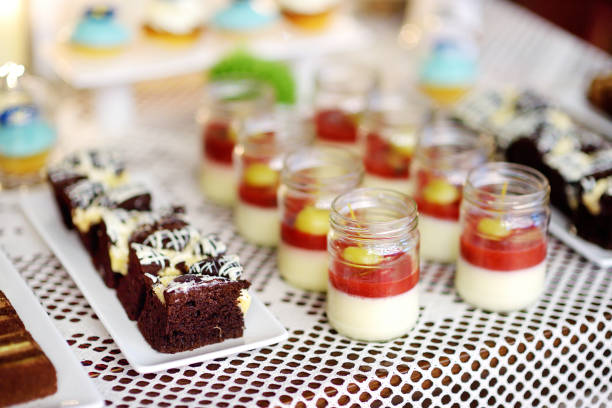 istock Decorated colorful cupcakes on a sweet table on some festive event 1467971174
