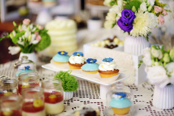 istock Decorated colorful cupcakes on a sweet table on some festive event 1467971196