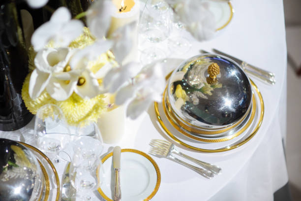 istock Beautiful table setting with crockery and flowers for a party, wedding reception or other festive event 1467972126