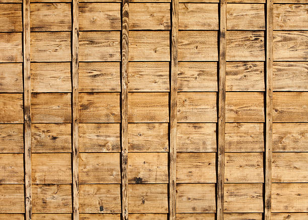 old look textured wood siding on a building stock photo