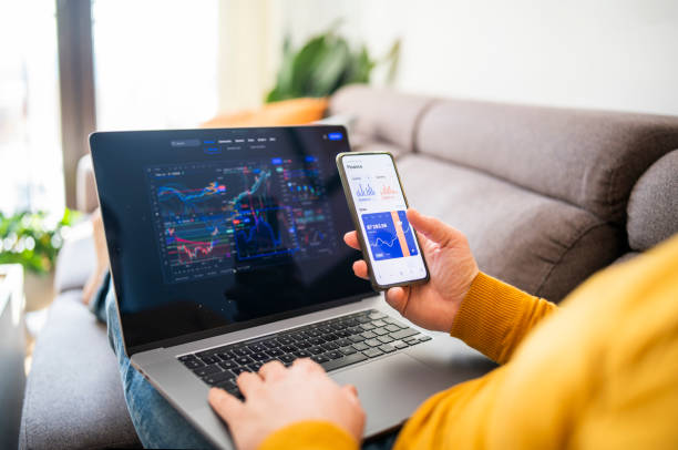 istock Shot of man at home trading with cryptocurrency. 1467976828