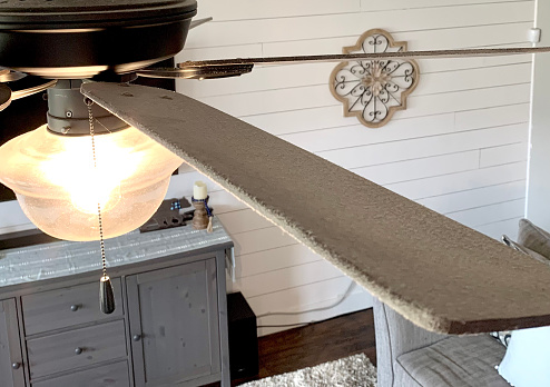 Dirty ceiling fan in family room