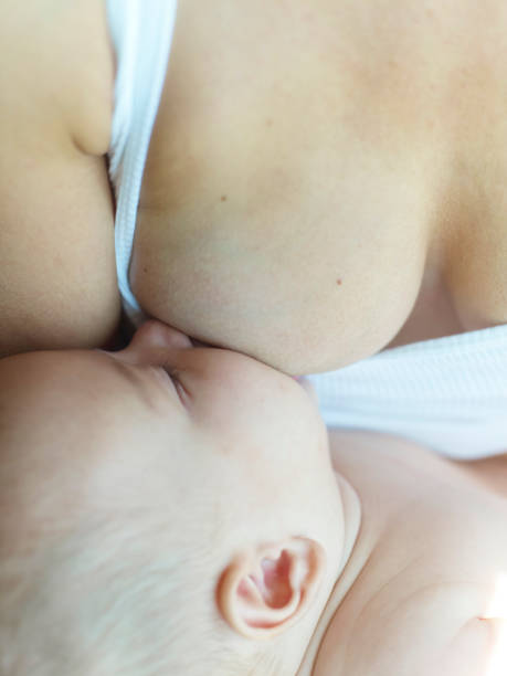 istock Mom breastfeeding her little baby boy 1467982085