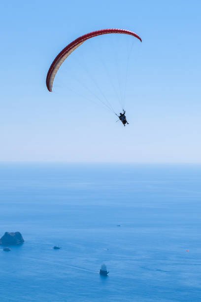 istock Vertical İmage of Paragliding in the sky 1467985448