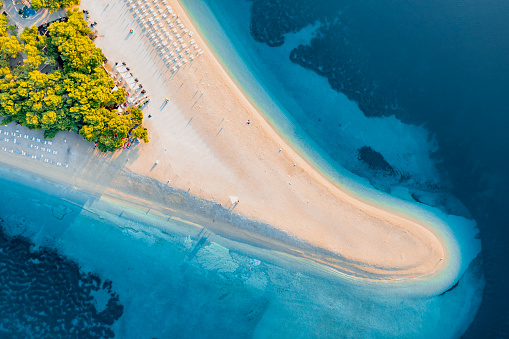Panoramic aerial view at the Zlatni Rat. Beach and sea from air. Famous place in Croatia. Summer seascape from drone. Travel - image