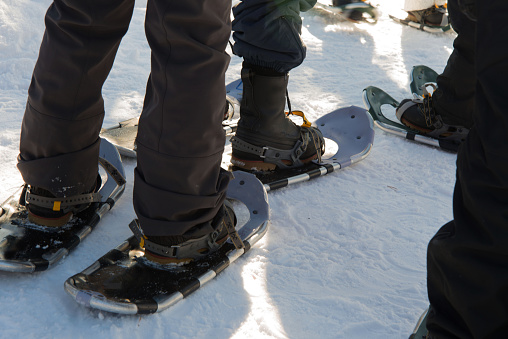 Close up of feet with snow rackets. Lapland