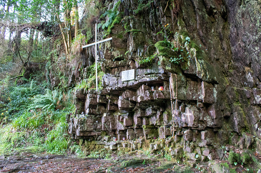 Holy wells are a unique aspect of Irish religious and cultural heritage. These are natural springs or wells that are considered sacred by the local communities. They are often associated with a particular saint, who is said to have blessed the well and given it healing properties. People visit these wells for various reasons, including seeking cures for ailments, offering prayers and devotions, or simply for the sense of peace and contemplation that the site offers.

In Ireland, there are over 3,000 recorded holy wells, each with their own unique history and folklore. Some of the most famous and revered wells include St. Brigid's Well in Kildare, St. Patrick's Well in Lough Derg, and Tobernalt Holy Well in Mayo.

Many holy wells are located in remote and rural areas, and they are often surrounded by ancient trees and stones. The wells are often marked by a simple stone or wooden structure, and they may be decorated with offerings such as ribbons, flowers, or religious statues.

The tradition of visiting holy wells is still very much alive in Ireland today, and many people continue to visit these sacred sites for prayer and contemplation. The practice of visiting holy wells is seen as an important way of maintaining a connection to the ancient traditions of Ireland and the country's rich spiritual heritage.