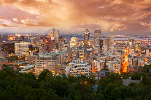 Downtown city skyline at night from Mount Royal in Montreal, Quebec, Canada