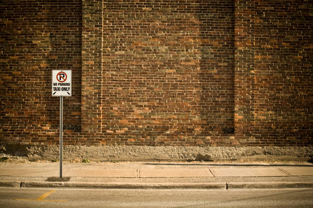 istock Empty blank brick wall on an old city street 1467988690