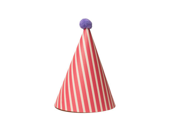 istock Bright and colorful birthday cap isolated on a white background. 1467989638