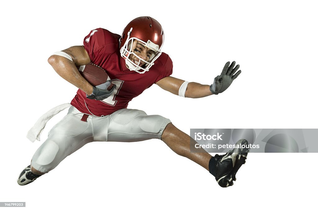 Football Runner American football player in action with ball American Culture Stock Photo