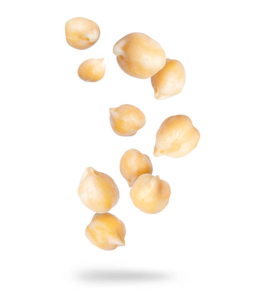 istock Chickpeas close up in the air on a white background 1467992668