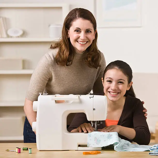 Photo of Mother and Daughter Sewing