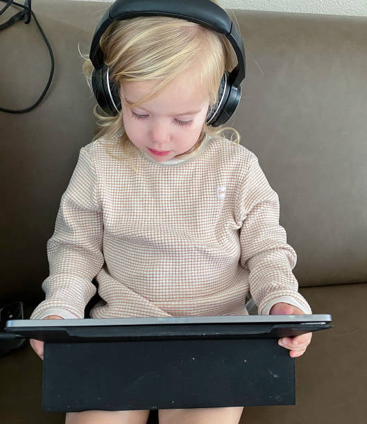 istock Toddle girl on tablet 1467994500