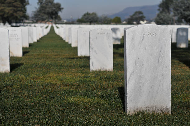 istock Cemetery with lots of gravestones in a row 146799477