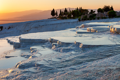 Layers of travertines form terraces of carbonate minerals in Pamukkale, Southwest Turkey.