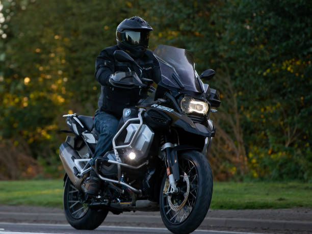 Bicester,Oxon,UK - Oct 9th 2022. Man riding a BMW R 1250 GS motorcycle on an English country road