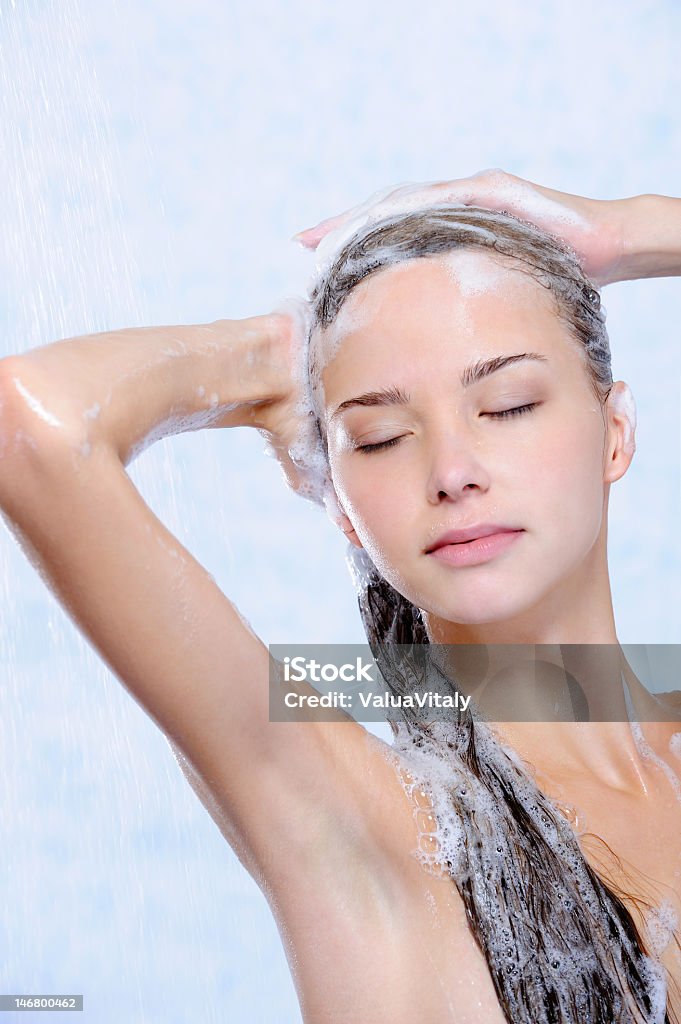 relaxation of young woman taking shower relaxation of young woman taking shower - close-up portrait Adult Stock Photo