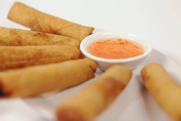 istock Vietnamese Chinese spring rolls on dish with sauce 146800937