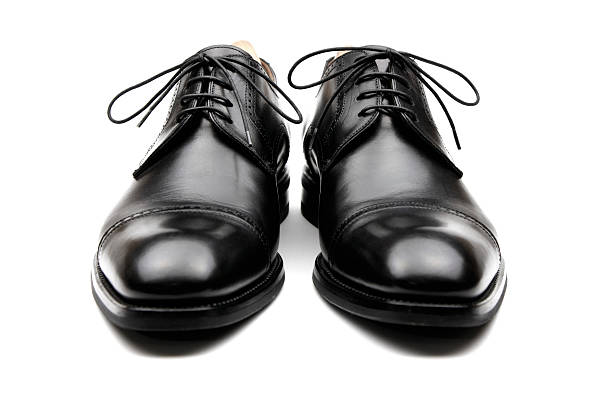 Men's Business Shoes Black leather men's dress shoes isolated on white brogue photos stock pictures, royalty-free photos & images