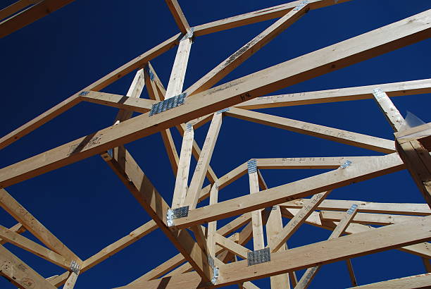 istock Roof trusses and clear blue sky 146801348