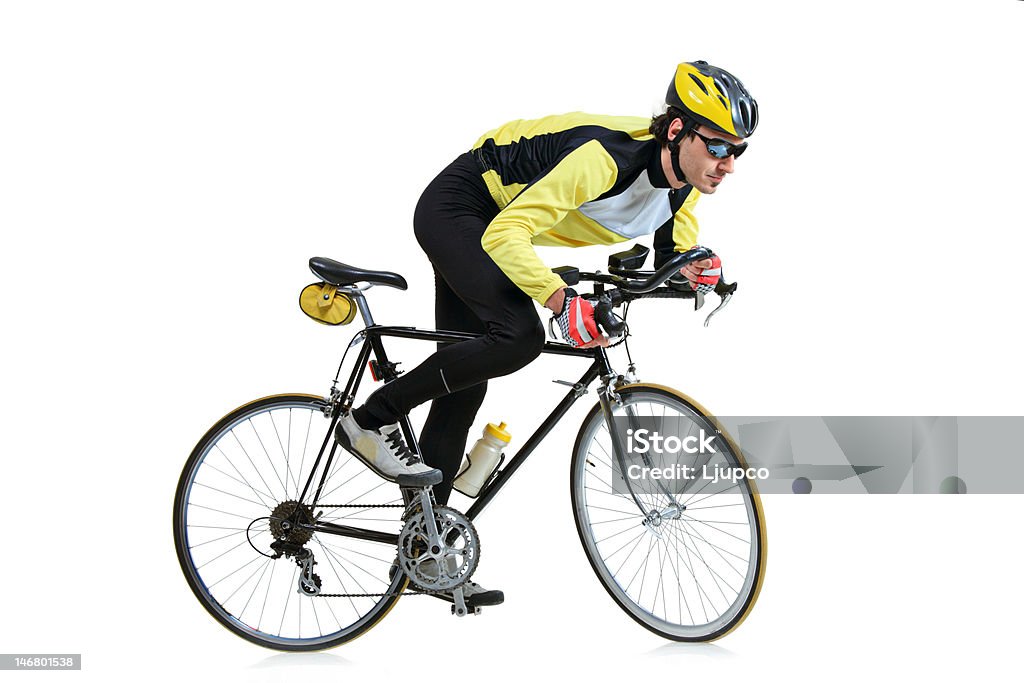 Giovane uomo che cavalca una bicicletta - Foto stock royalty-free di Abbigliamento